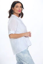 Side image of made in italy white henley embellished heart shirt. Roll sleeve white top. 