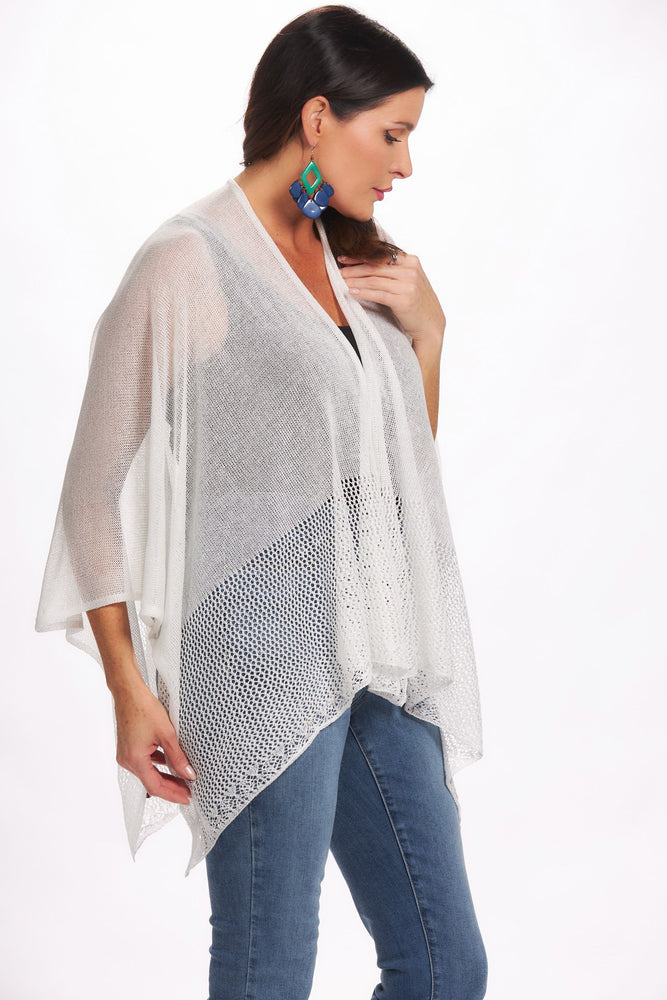 Side image of magic scarf white shawl. White lightweight knit ruana. 