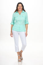 Front image of Elo roll sleeve button front blouse. Yucca green roll sleeve top. 