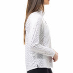 Side image of SanSoleil solshine long sleeve top. White and silver printed top. 