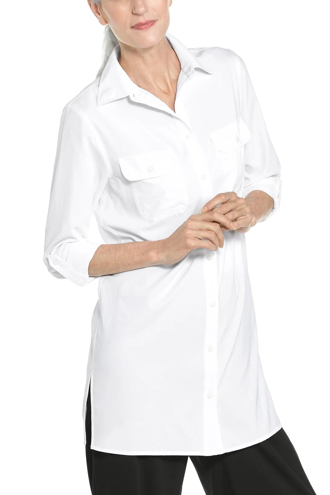 Front image of Coolibar long sleeve Santorini tunic shirt. Button front white top. 