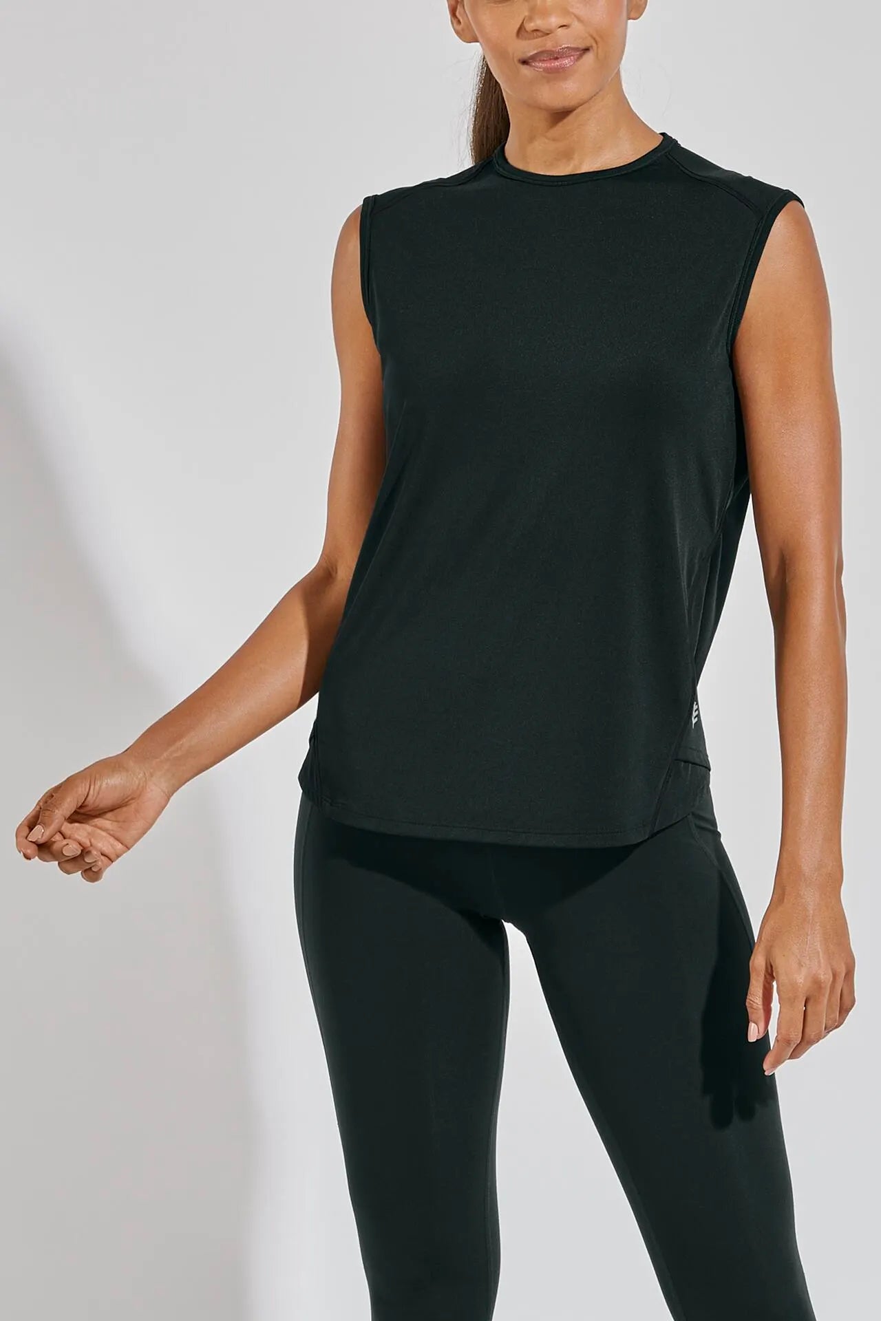 Front image of Coolibar accelera tank top. Sleeveless tank top in black. 