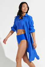 Front image of Coolibar Kitts Shirt Dress. Sailor blue long sleeve dress. 
