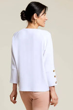 Back image of Tribal crew neck top with buttons. White 3/4 sleeve top. 