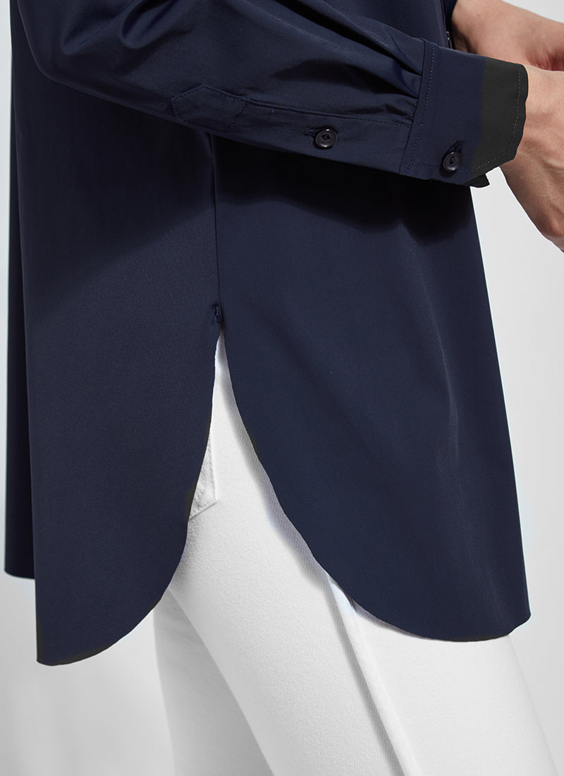 Rounded hem view of Lysse schiffer button down top. True navy long sleeve top. 