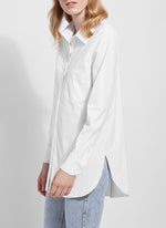 Front view of Lysse schiffer button down shirt. White long sleeve top. 