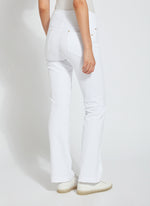 Back view of Lysse baby bootcut denim pants in white. Pull on lysse pants. 