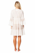 Back image of La moda white wide sleeve dress. Cover up white dress. 