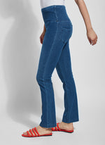 Side view of Lysse denim straight leg pant. Pull on pant in midwash blue. 