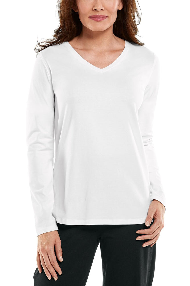 Morada Everyday Long Sleeve Deep V-Neck T-Shirt UPF 50+ V-neck, straight hem. Made by Coolibar. Shirt is white.