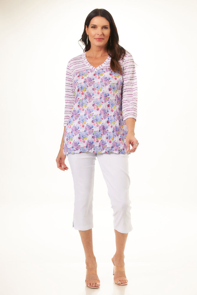 Front image of Shana crinkle v-neck top. Purple dots pattern. 