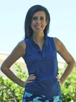 Front image of AnaClare calla solid ruffle top. Sleeveless tank top in navy. 