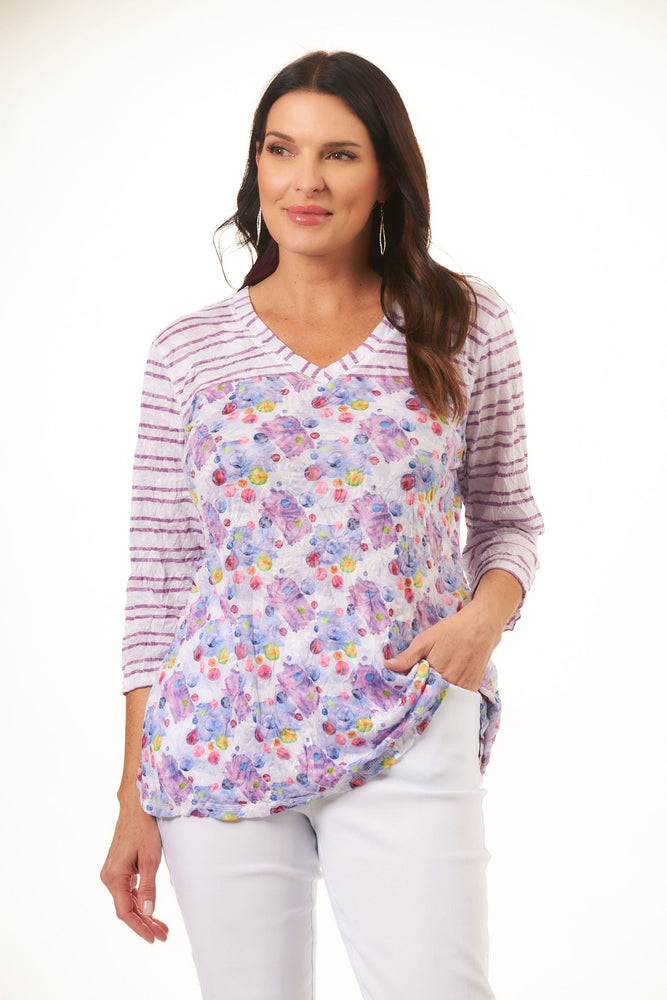Front image of Shana crinkle v-neck top. Purple dots pattern. 