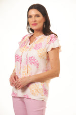 Front view of Tribal flutter sleeve print blouse. Sorbet floral print. 