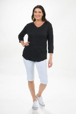 Full outfit view of Shana black crinkle top. V-neck half sleeve crinkle top. 