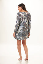 Back image of Ariella 3/4 sleeve zip dress. Blue paisley printed dress. 