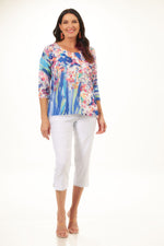 Front image of Cubism 3/4 sleeve back button top. 3/4 sleeve multi color scoop neck top. 