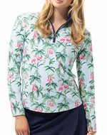 Front image of SanSoleil long sleeve mock neck top. Flamingo palm printed long sleeve. 