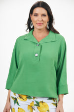 Front image of Last Tango gucci green 3/4 sleeve top. 2 button air flow shirt. 