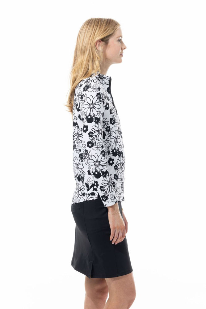 Side image of SanSoleil black and white sundance long sleeve top. 