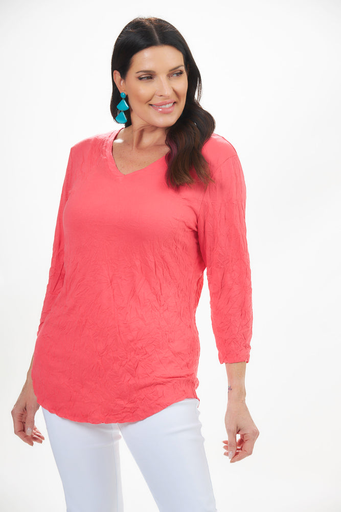 Front view of shana crinkle top in melon. Half sleeve v-neck crinkle top. 