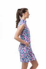 Side image of SanSoleil mock neck dress. Jungle printed dress with pockets. 