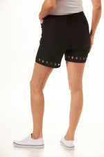 Back image of Lulu B short with diamond shape cutout. Black pull on basic shorts. 