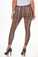destination collection pull on print legging brown and orange snake