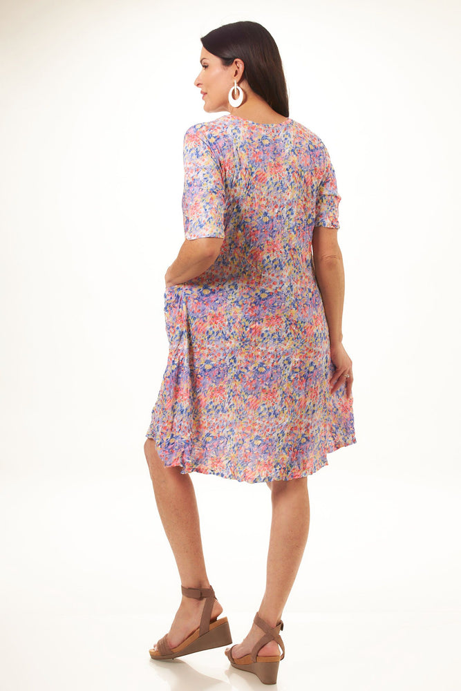 Back image of Shana 1/2 sleeve printed crinkle dress. Purple floral print midi dress. 