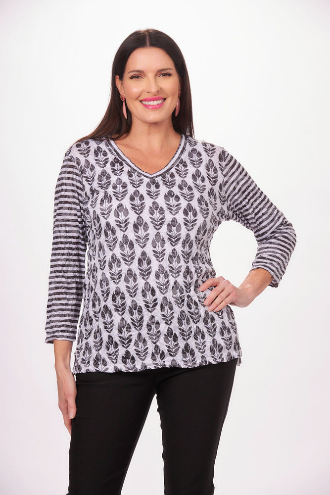 Front image of Shana 3/4 sleeve v-neck print mix crinkle top. Black and white printed top. 