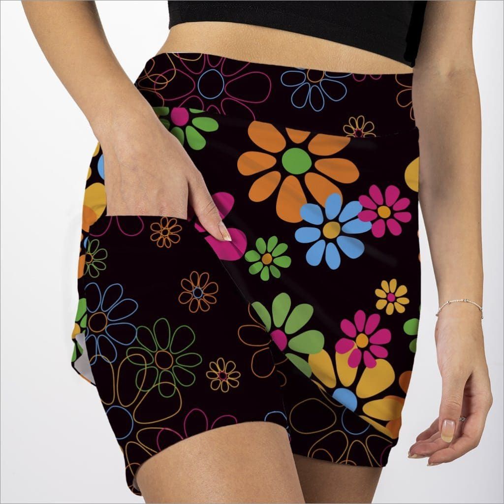 Front image of skort obsession night daisies skort. Pull on floral printed skort. 