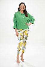 Front full outfit image of up! white and yellow pull on pants. Techo slim pant petal trim in lemon print. 