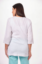 Back image of Lulu B scoop neck top with pocket. White classic tunic top. 