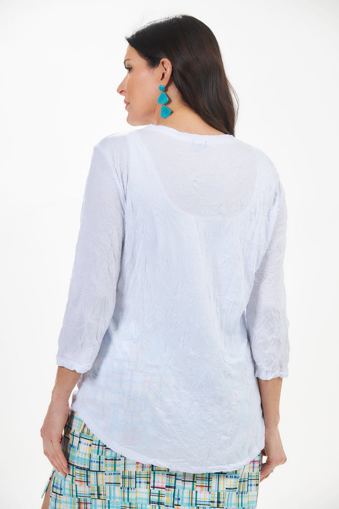 Back view of shana white crinkle top. Half sleeve v-neck crinkle top in white. 